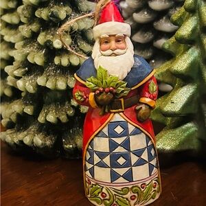 Jim Shore Santa Figurine with Red and Blue Quilt Design
